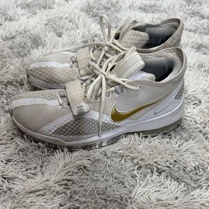 Nike Ivory and Metallic Gold Athletic Shoes